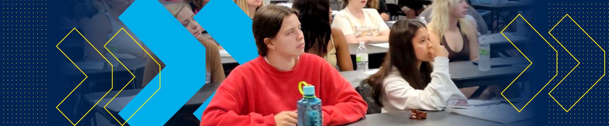 Students listening to a speaker