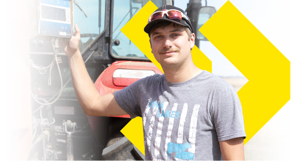 Iowa Lakes Agriculture student hands on learning with tractor