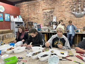 Students creating glass art