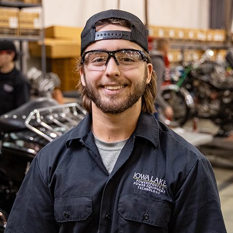 Powersports student with safety glasses