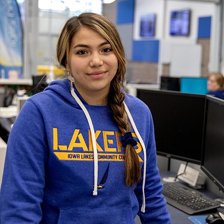 Sales & Marketing student in blue sweatshirt